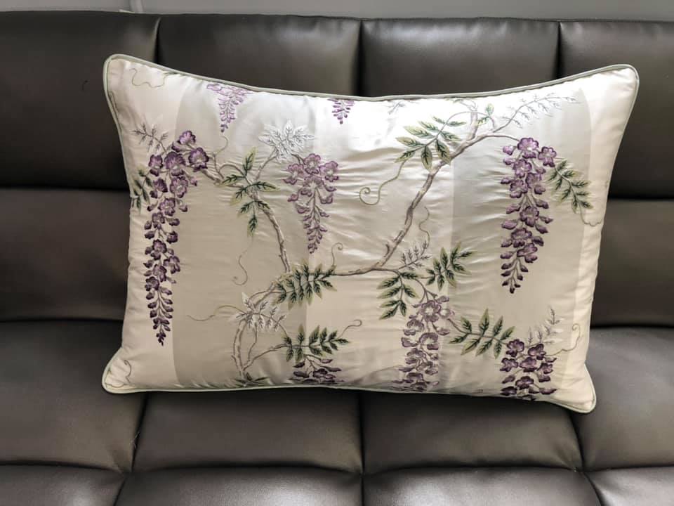 Decorative embroidered floral cushion